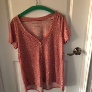 Pink tee shirt with small flowers
